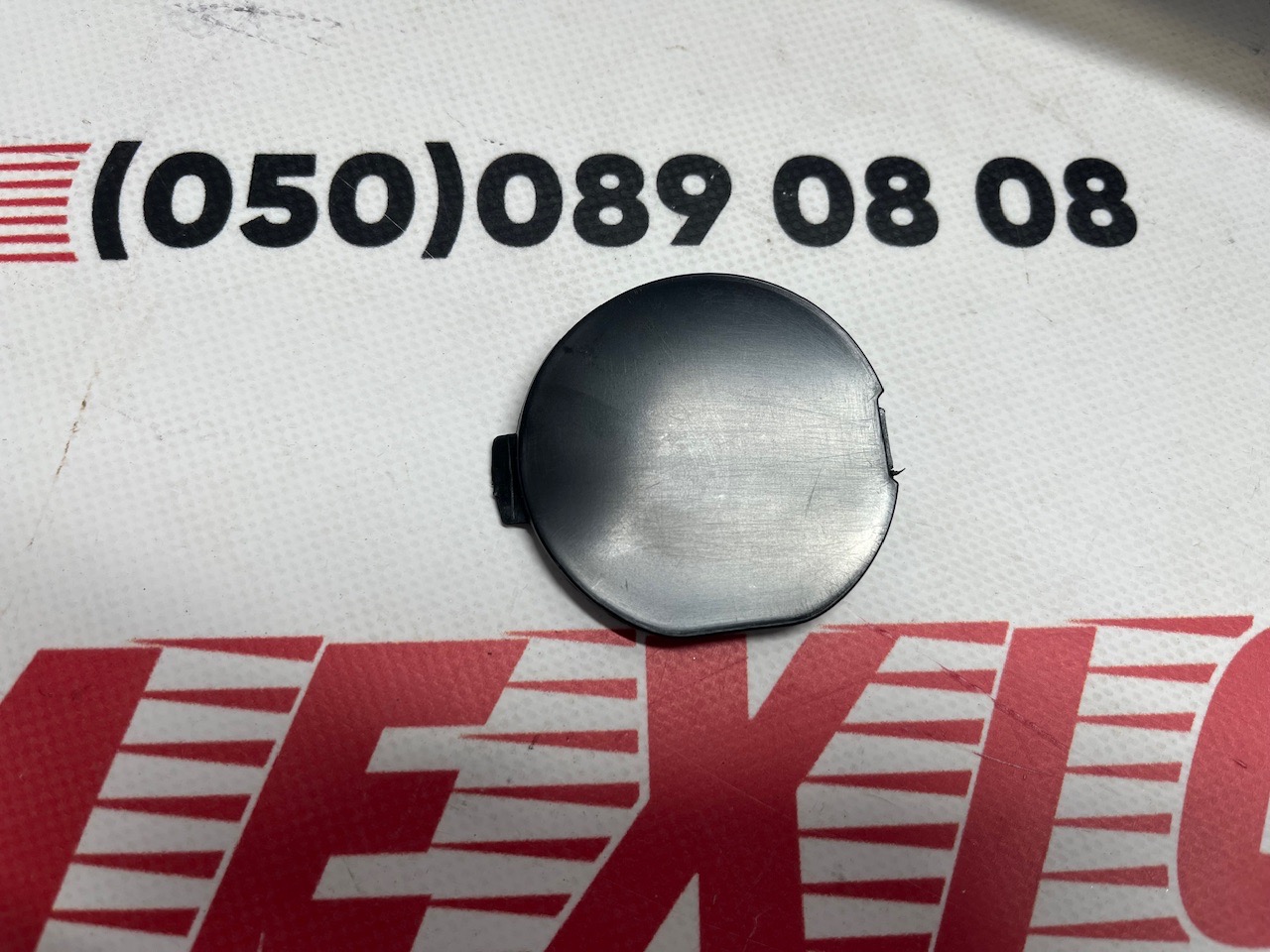 Заглушка крюка переднего бампера Mazda CX5 2017-2020 (KL2F50A11BB), аналог