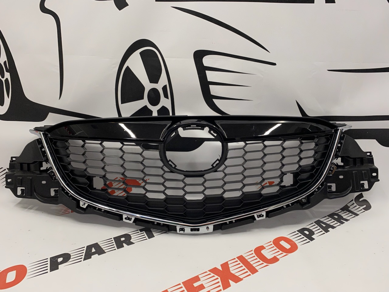 Решётка радиатора в сборе черная Mazda CX5 2011-2014 (KD4550710E), аналог