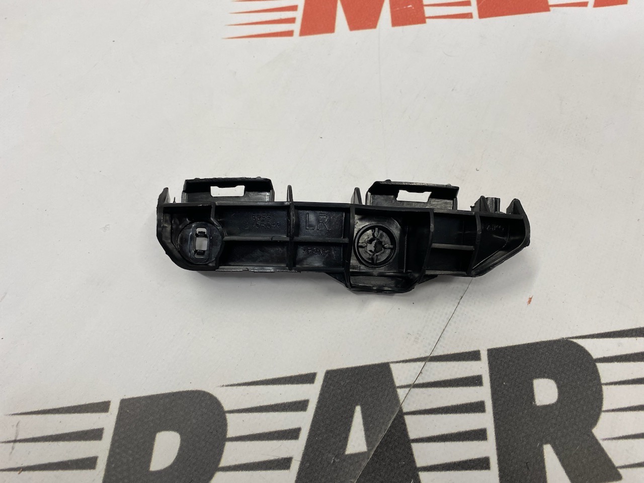 Крепление заднего бампера левое верхнее Toyota RAV-4 2013-2015 (525630R030), аналог