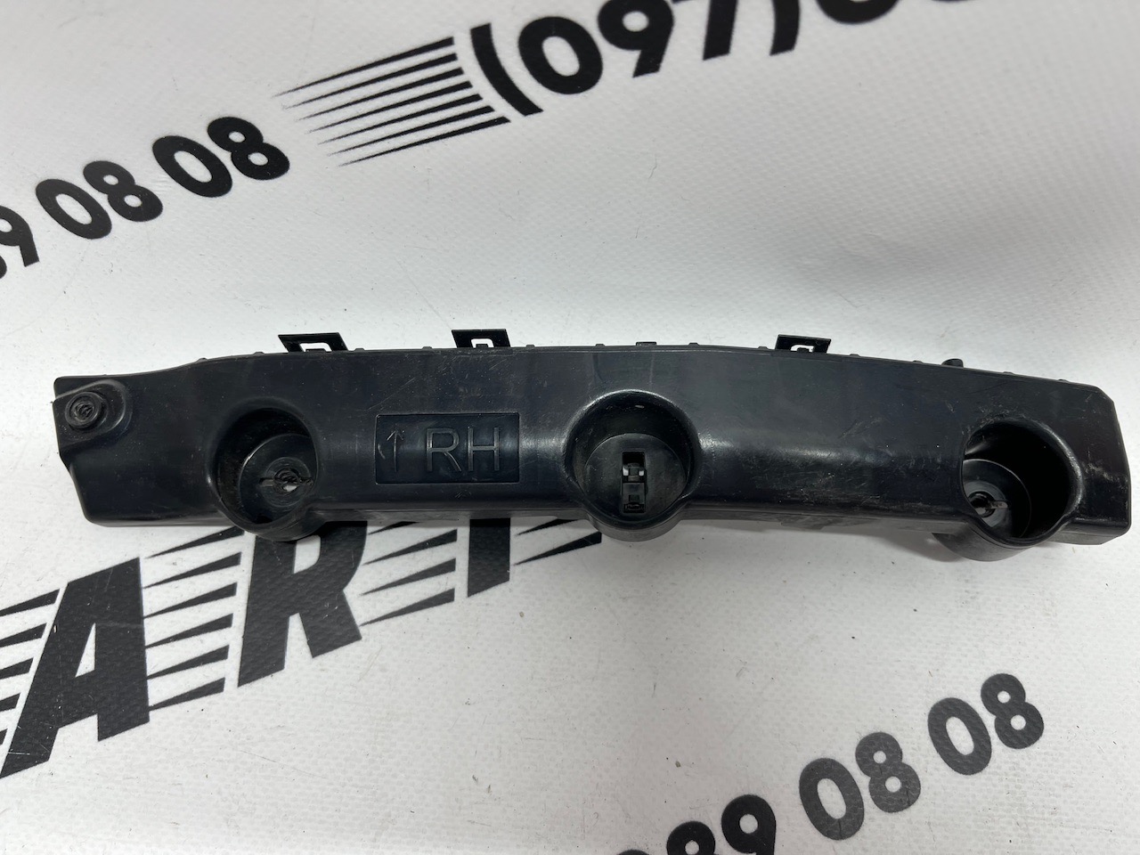 Кріплення переднього бампера праве оригінал Б/У Nissan X-Trail(Rogue) 2014-2020 (62222-4BA1A)