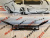 Решітка переднього бампера під парктронік Volkswagen Jetta 2023 (17a853677e9b9), аналог